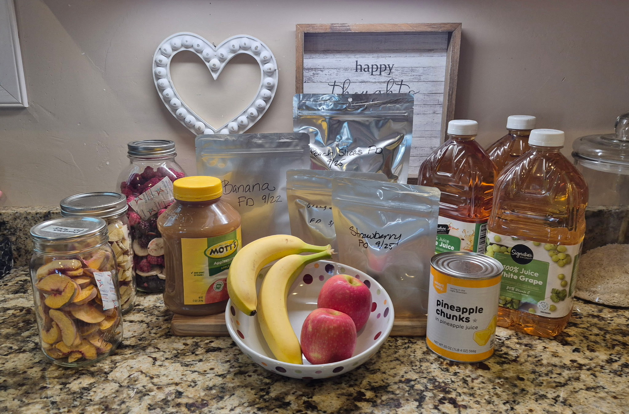 Fruit in many forms for long-term food storage, banana, apple, applesauce, apple juice, grape juice, oranges, berries, strawnberries, peaches